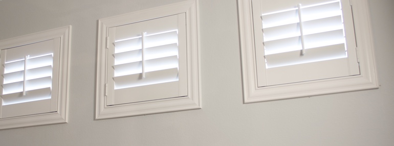 Square Windows in a Cleveland Garage with Plantation Shutters